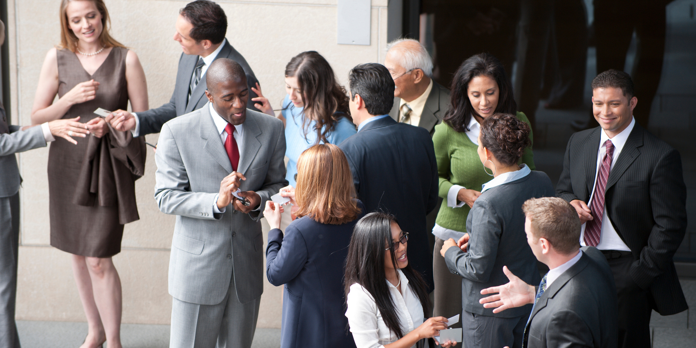 Business professionals networking and building commercial finance relationships