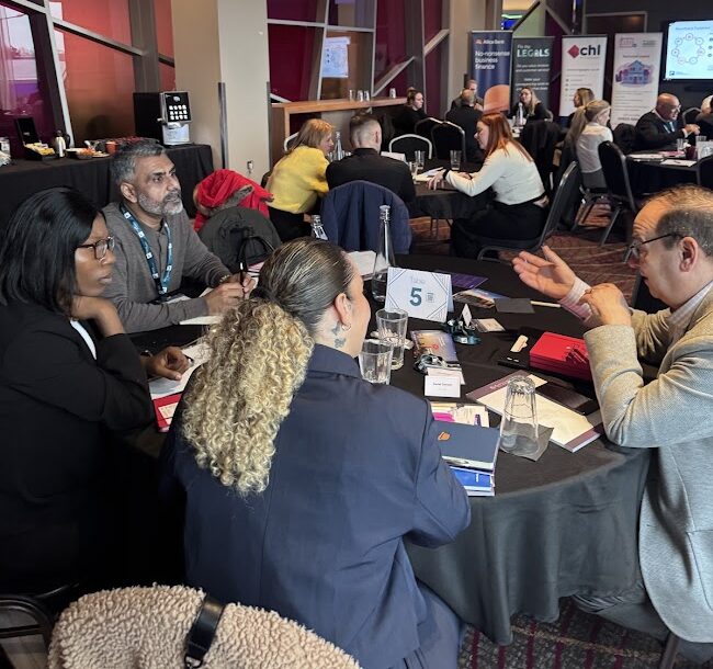 Commercial finance brokers networking and sharing industry expertise at an FCN event.
