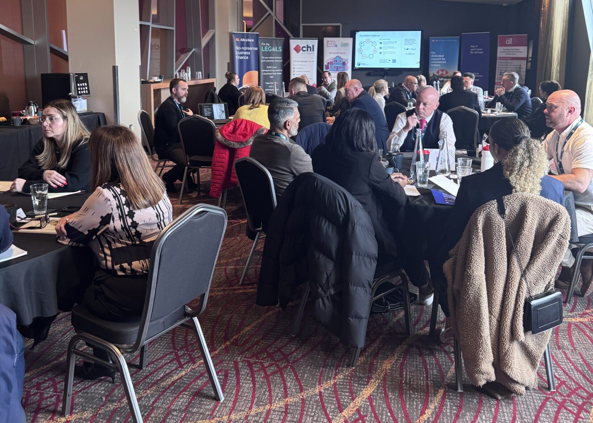 Brokers and lenders networking at a Fiducia Commercial Network event